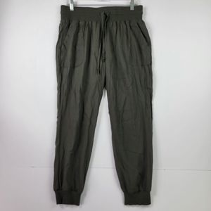 Rewash women Jeggings pants size M pockets green olive elastic tie waist